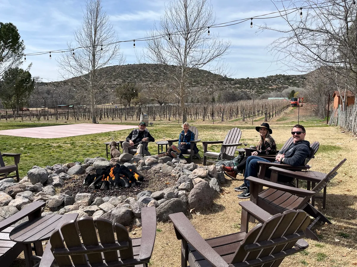 Fire pit and vineyard seating at a boutique Cottonwood winery